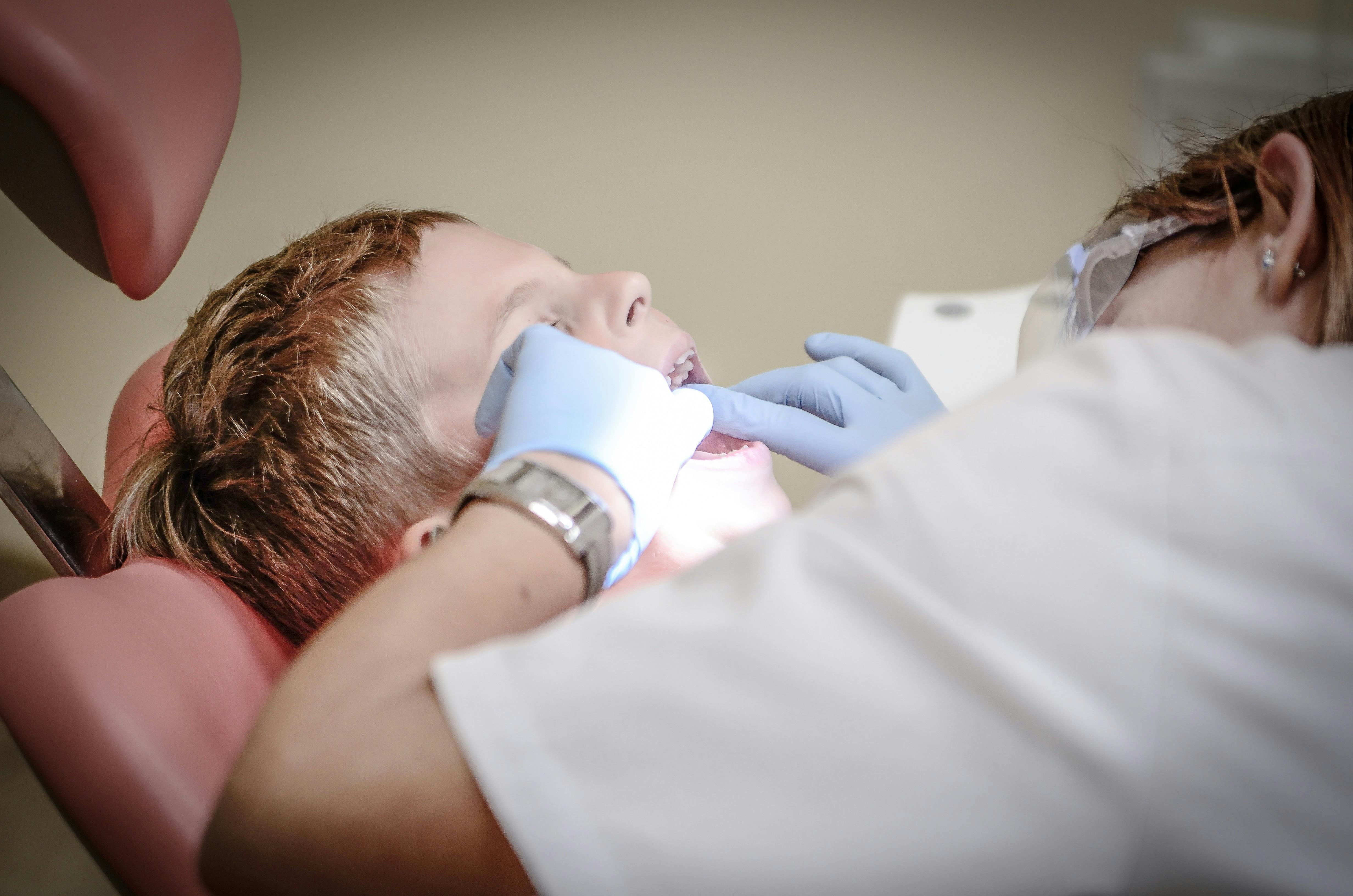 Young patient receiving gentle dental care